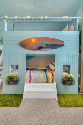 Your own tiki hut doubles as a bunk bed