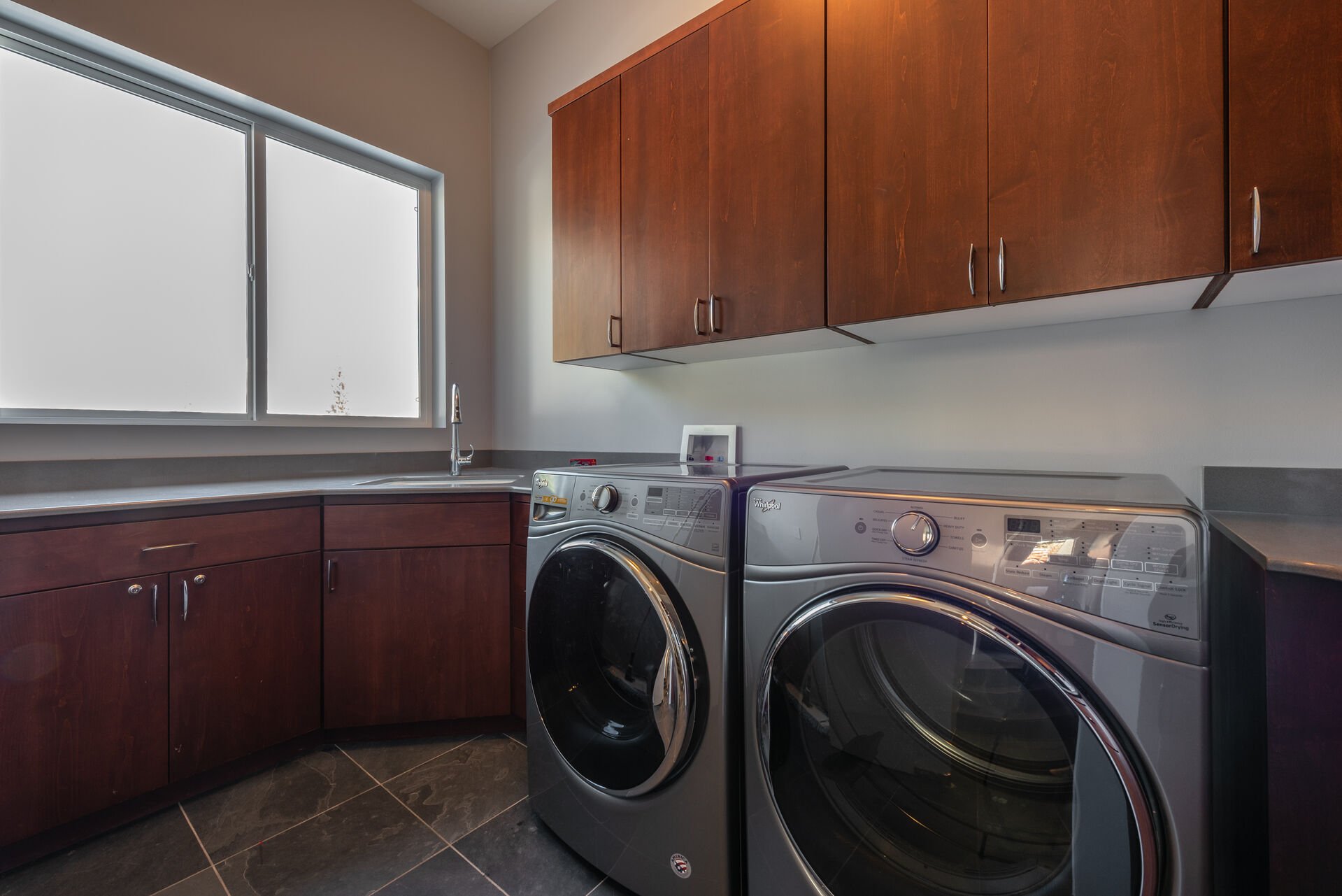 Main Level Laundry and Also a Washer / Dryer on the Upper Level