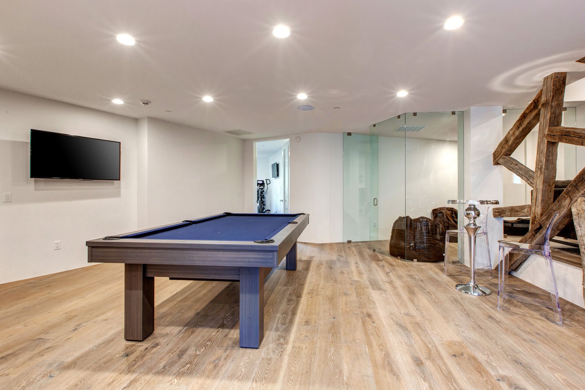 Watch Your Favorite Sports Team While Showing Your Skills on the Pool Table