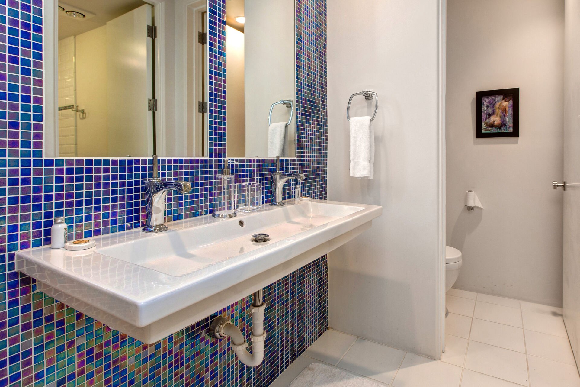 Lower Level Full Shared Bath with a Double Sink, Water Closet and Separate Tub/Shower Combo