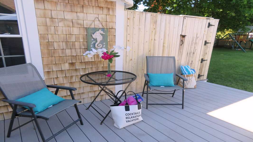 Enjoy your favorite libation at the café table while you wait to be next to take an out door shower (enclosed with hot and cold water!), a tradition on the Cape! - 25 Grey Neck Road West Harwich Cape Cod - New England Vacation Rentals