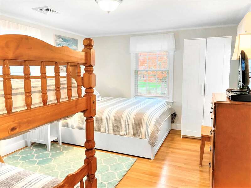 Bedroom 2 with a Queen bed and bunk beds - 25 Grey Neck Road West Harwich Cape Cod - New England Vacation Rentals