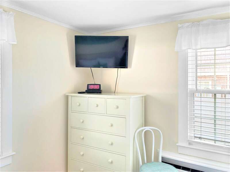 Bedroom 3 with a dresser and flat screen tv - 25 Grey Neck Road West Harwich Cape Cod - New England Vacation Rentals