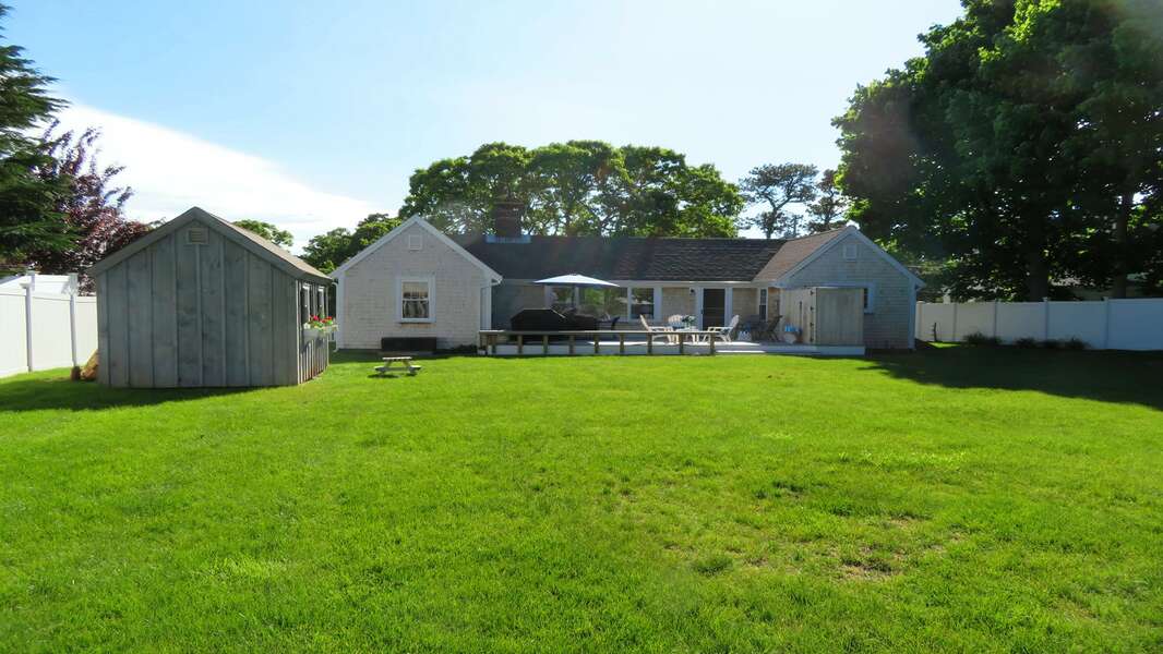 Large flat back yard allows plenty of room for a wiffle ball game or to kick a ball around. Fully fenced in! - 25 Grey Neck Road West Harwich Cape Cod - New England Vacation Rentals
