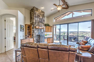 Elegant great room with fireplace, TV for streaming and unbeatable views of park, town, wildlife and July 4th fireworks.