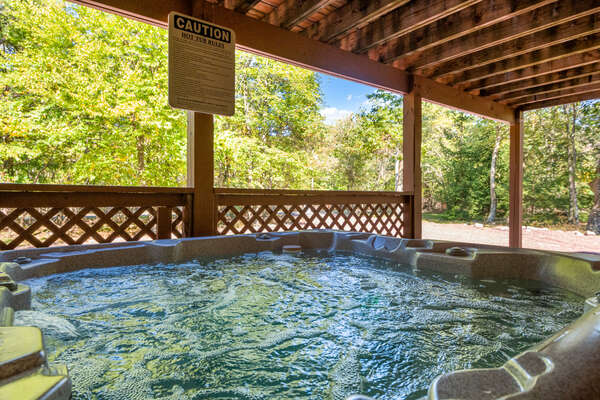 hot tub underneath deck at a home for rent in lake harmony pa