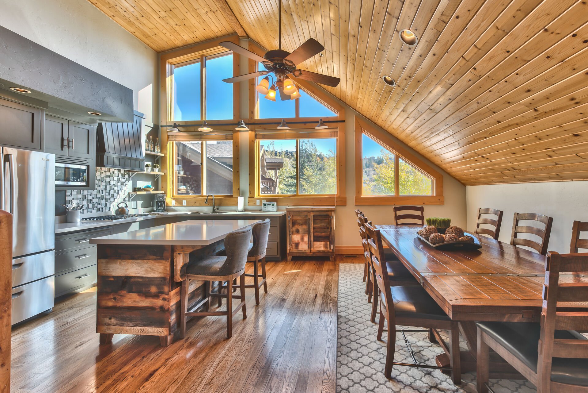 Kitchen and Dining Area with Hardwood Floors and Mountain Views