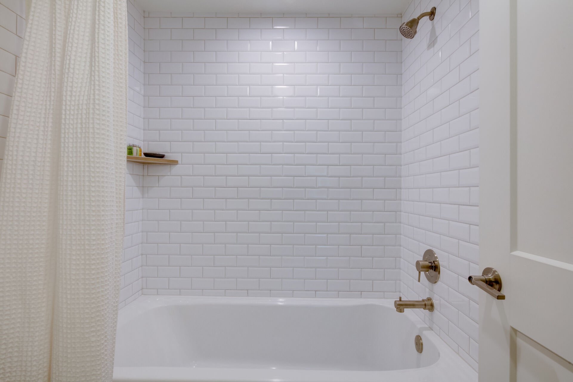 Completely Renovated Master Bath with a Quartz Counter Sink and a Tile/Glass Shower