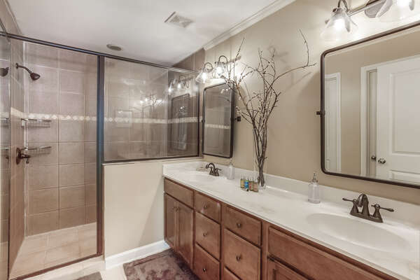 Double Vanity Sink, Walk-In Shower, Mirrors, and Lamps