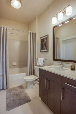 Guest Bathroom With Large Mirror