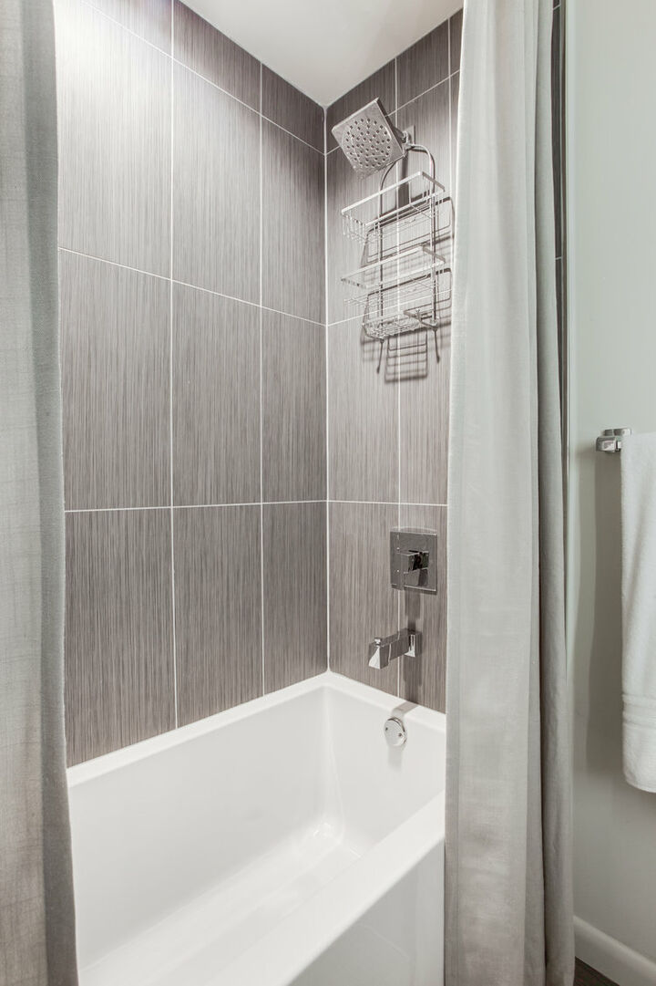 Shower-Tub Combination with Curtain.