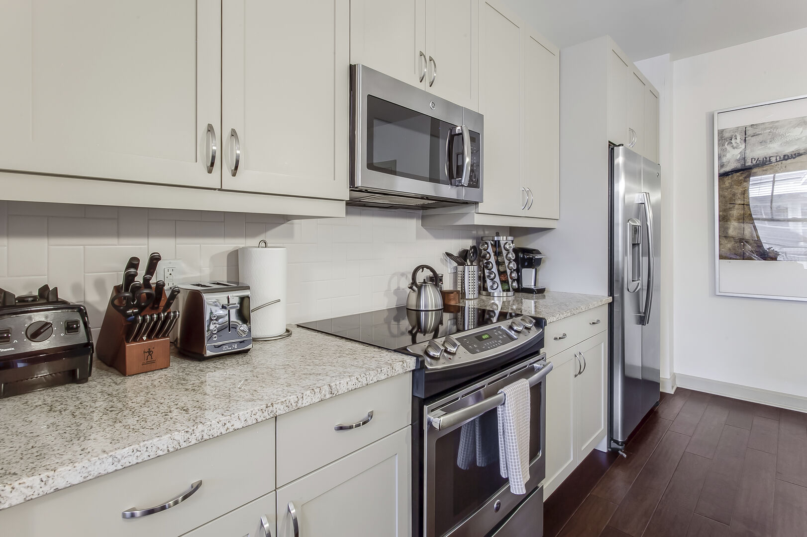 This Atlanta Rental Apartment has a kitchen area with stove and microwave