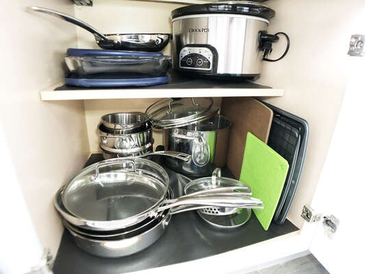 Stainless steel pots and pans, a non-stick/non-scratch pan also included for easy cleanup!  Baking sheets to make your cookies and a crock pot to get your dinner started while you hang out at the beach!!!