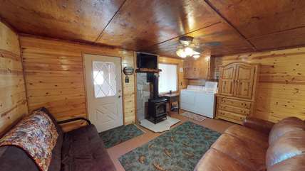 Lower level family room with  gas fireplace.
washer and dryer for guests convenience.