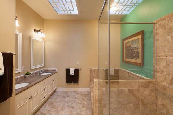 Bathroom with His and Her Sinks, Bathtub and Walk-in Shower