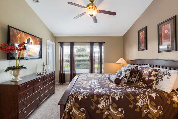 Watch TV from bed in the large master suite
