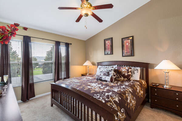 The master bedroom features a king bed and plenty of space to relax