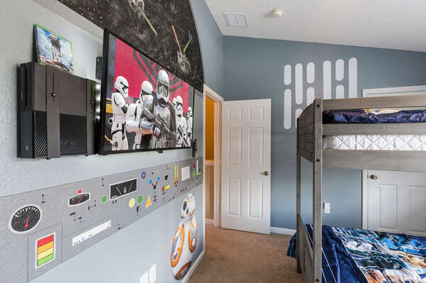 The kids bedroom features two twin over twin bunk beds