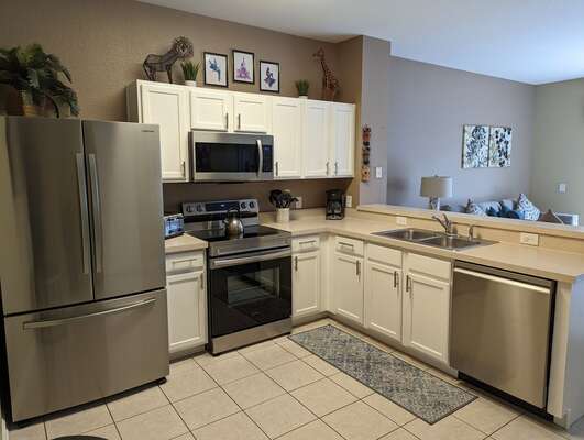 Cook meals in this large fully-equipped open kitchen