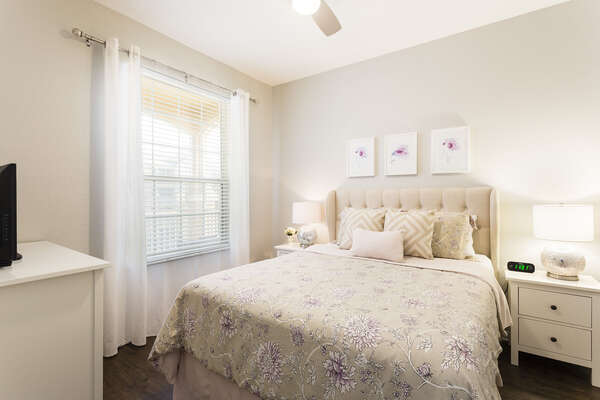 The 2nd bedroom features a queen-sized bed