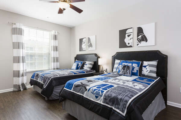 The kids and young adults will LOVE this galactic bedroom with two queen beds