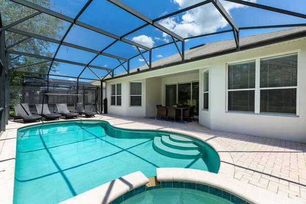 A screened-in private pool and spillover spa for all to enjoy