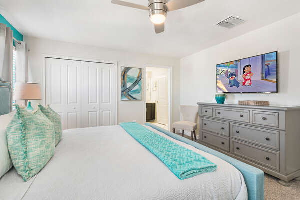 The room features a king size bed, 49-inch SMART TV, and en-suite bathroom