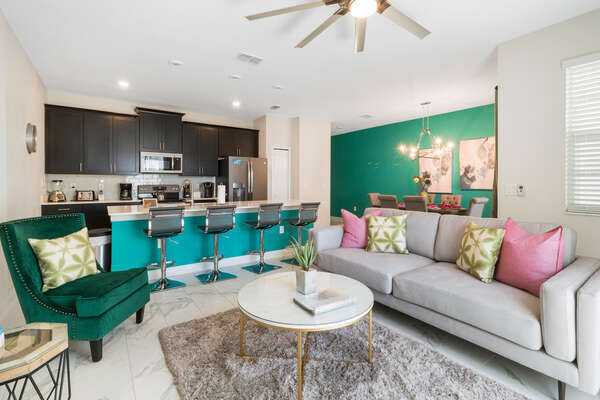 The living area features comfortable seating for the whole family to relax together