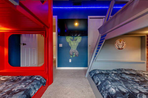 Kids can watch their favorite superhero movie in this awesome bedroom