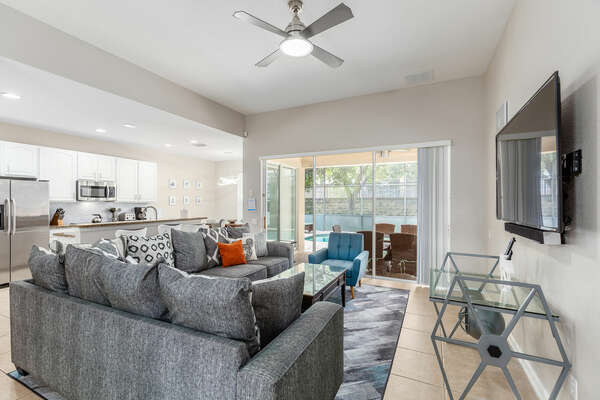 Relax and unwind in the living area with views of the pool area