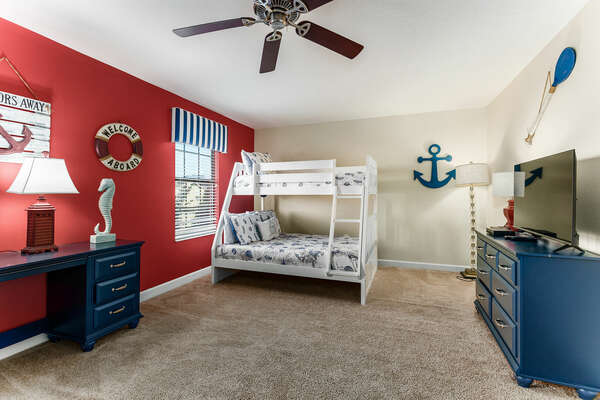 Kids will love this nautical room designed just for them, with two twin over full bunk beds