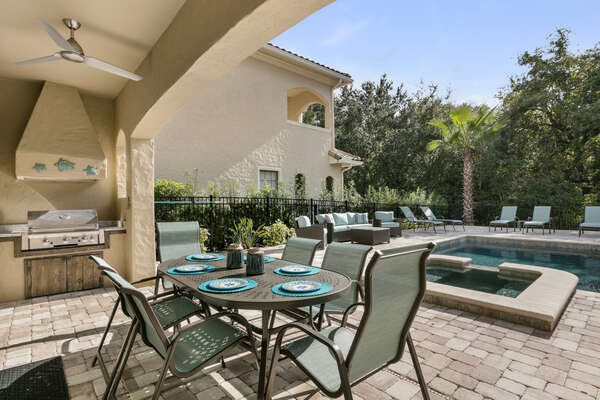 Enjoy meals al fresco out by your gorgeous pool