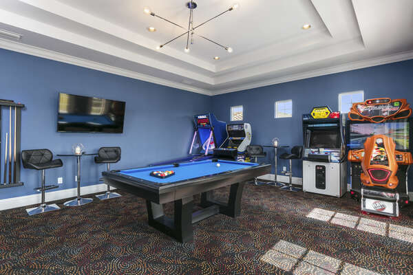 The games room features an air hockey table, pool table, 60-inch SMART TV, and more