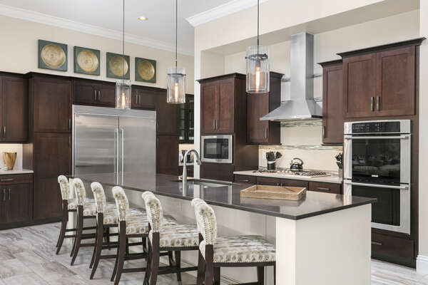 Spacious kitchen area with a breakfast bar
