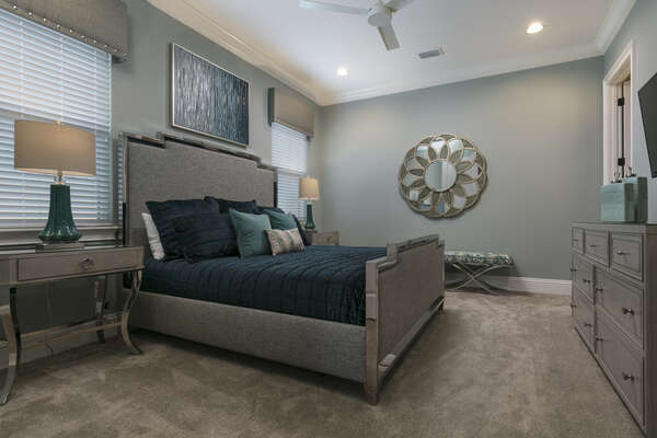Master suite located on the second floor features a king size bed and 50-inch SMART TV