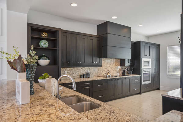 The modern and newly updated kitchen opens out into the living area