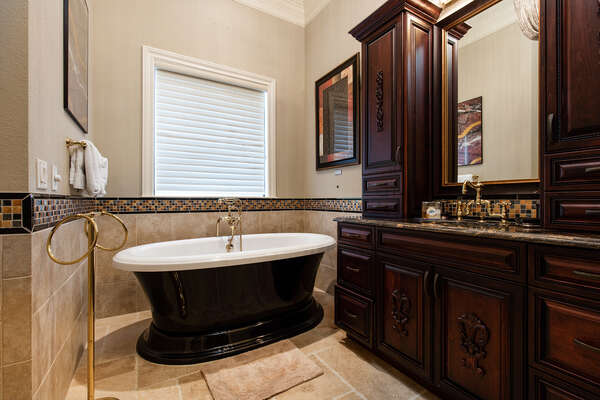 The second master bathroom has a gorgeous soaking tub and shower