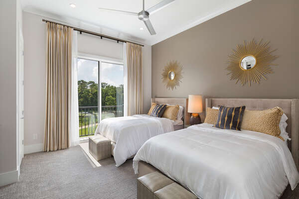 Master Suite 9 features two full beds with access to the patio balcony