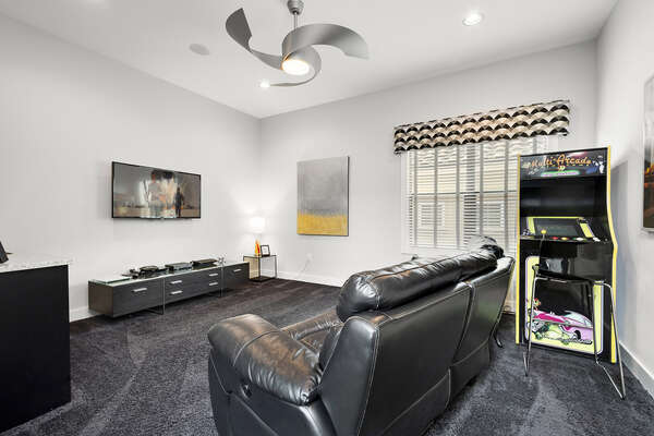 The games room features a 50-inch TV, PlayStation 3, Wet bar, and 60-in-1 multi-arcade machine