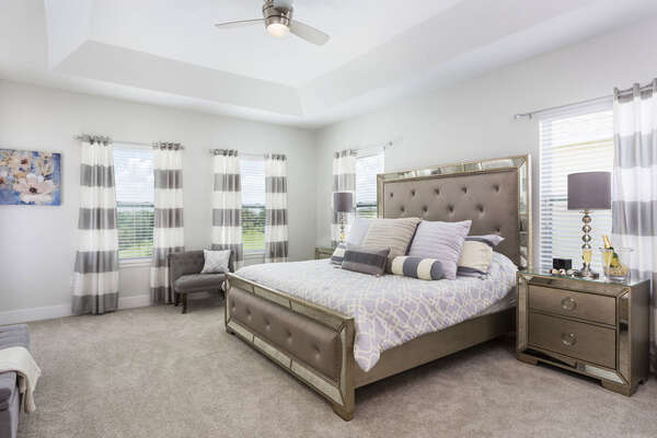 This upstairs master features a King bed in a oversized bedroom