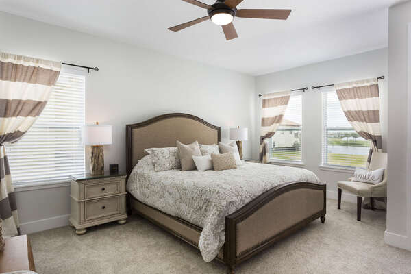 This master bedroom features a King bed, your own private balcony and beautiful rustic furnishings