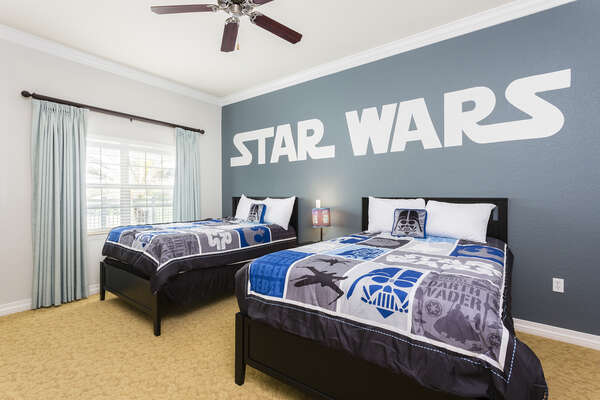The kids will love the Stars Wars theme bedroom with 2 full beds