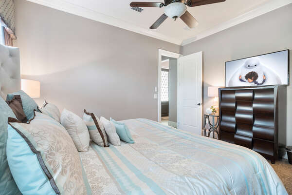 The master bedroom features a 50-inch SMART TV and en-suite bathroom