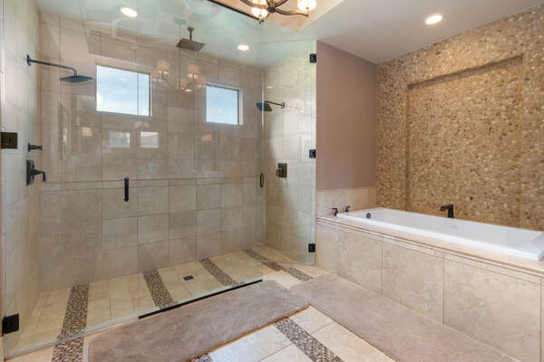 The master bathroom also features a double shower with rain shower heads
