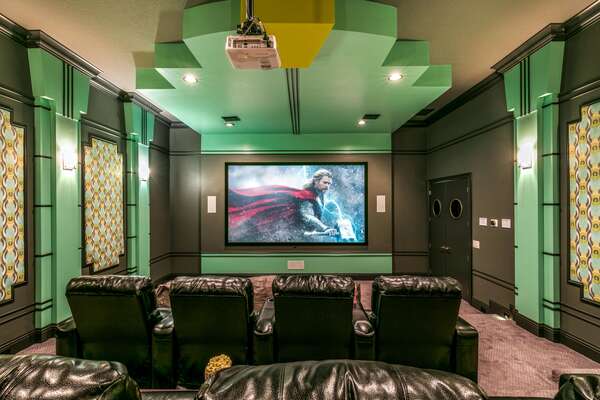 It features a 119-inch projection screen , Apple TV 2, Smart DVD player, seating for up to 12, and 4 bean bags