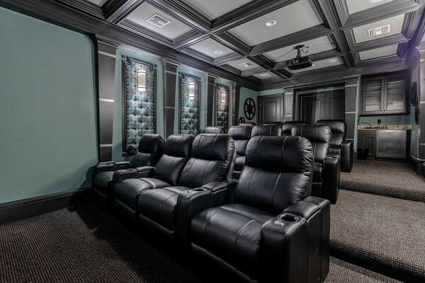 The private home theater offers comfortable seating for the whole family