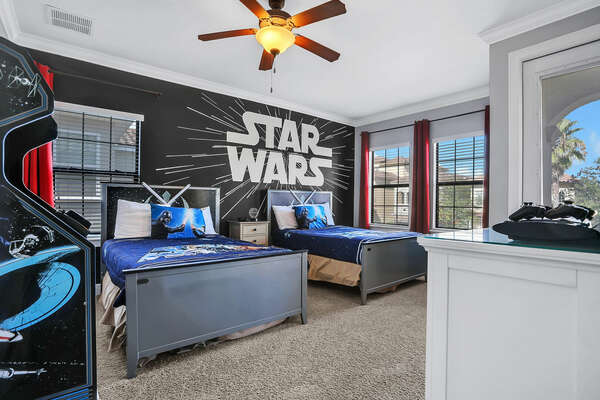 This galaxy themed room is perfect for the older kids with the arcade game also located in the room
