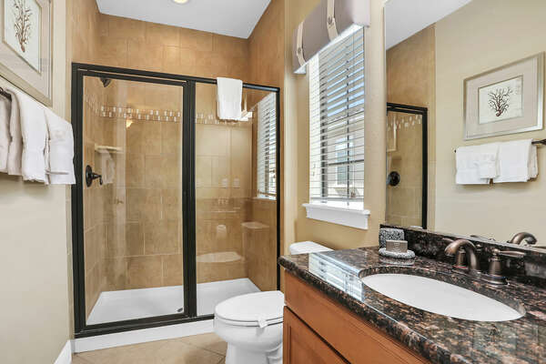 The master suite offers a walk in shower