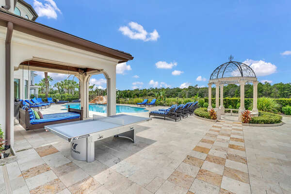 Gazebo and pool deck with ping pong table