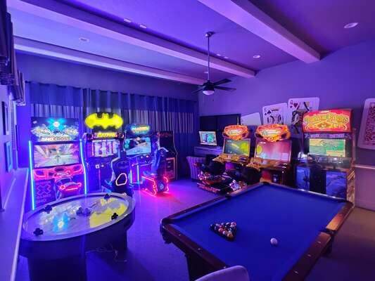 Fully equipped for fun with a pool table, air hockey, foosball table, plenty arcade games and video game platforms
